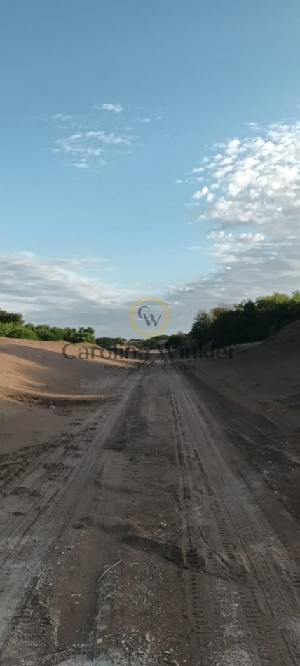 Loteo cerca de Dunamar.